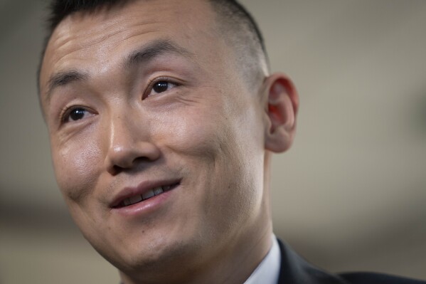 FILE - Baimadajie Angwang is interviewed at the Law Office of John F. Carman, Esq., Feb. 1, 2023, in Garden City, N.Y. (AP Photo/John Minchillo, File)