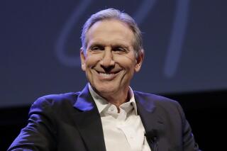 FILE - Howard Schultz speaks at an event to promote his book, "From the Ground Up," in Seattle on Jan. 31, 2019. Starbucks President and CEO Kevin Johnson said Wednesday, March 16, 2022, he will retire next month, and former CEO and company founder Howard Schultz will replace him on an interim basis. (AP Photo/Ted S. Warren, File)