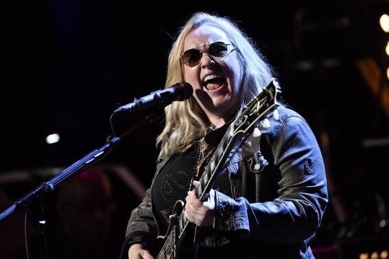 FILE - Melissa Etheridge performs at the sixth annual Love Rocks NYC benefit concert for God's Love We Deliver in New York on March 10, 2022. Etheridge will unveil a solo show mixing her music and stories this fall off-Broadway. “Melissa Etheridge: My Window – A Journey Through Life” will play 12 performances only starting Oct. 13 at the midtown multi-stage venue New World Stages. (Photo by Evan Agostini/Invision/AP, File)