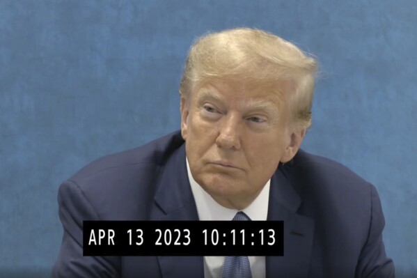 In this image taken from from video made public by the Office of the New York State Attorney General on Friday, Jan. 19, 2024, former President Donald Trump sits for a deposition on April, 13, 2023, where the former president came face-to-face with the New York State Attorney General Letitia James at her Manhattan, New York Office. (Office of the New York State Attorney General via AP)