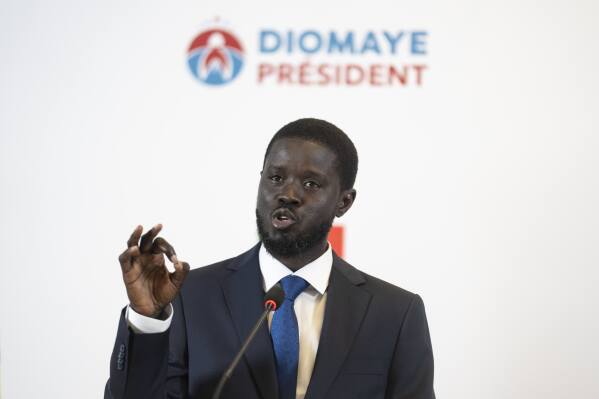 Bassirou Diomaye Faye holds a press conference after winning the presidential elections in Dakar, Senegal, Monday, March 25, 2024. (AP Photo/Mosa'ab Elshamy)