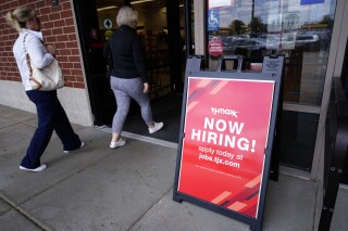 A hiring sign is displayed at a retail store in Vernon Hills, Ill., Monday, June 12, 2023. On Thursday, the Labor Department reports on the number of people who applied for unemployment benefits last week.(AP Photo/Nam Y. Huh)