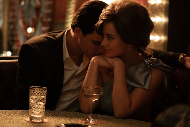 This image released by A24 shows Jacob Elordi as Elvis, left, and Cailee Spaeny as Priscilla, in a scene from 