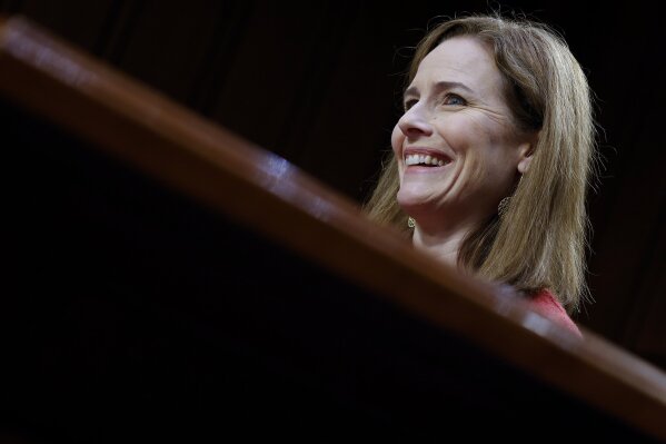 Supreme Court nominee Amy Coney Barrett speaks during the second day of her confirmation hearing before the Senate Judiciary Committee on Capitol Hill in Washington, Tuesday, Oct. 13, 2020. (Samuel Corum/Pool via AP)