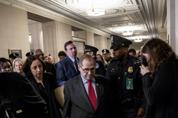 Chairman Jerrold Nadler, D-N.Y. leaves after the House Judiciary Committee passes both articles of impeachment, accusing President Donald Trump of abusing power and obstruction of Congress, Friday, Dec. 13, 2019, on Capitol Hill in Washington. (AP Photo/Andrew Harnik)