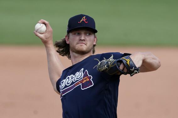 FILE - In this March 30, 2021, file photo, Atlanta Braves starting pitcher Mike Soroka delivers in the sixth inning of a spring training baseball game against the Boston Red Sox in Fort Myers, Fla. Soroka spoke Monday, Aug. 23, 2021, for the first time since getting the shocking news that he re-tore his Achilles tendon and would need another major operation. (AP Photo/John Bazemore, File)