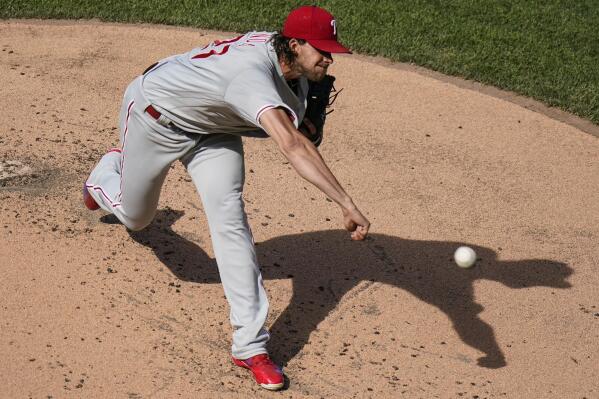 Philadelphia Phillies' Aaron Nola delivers a pitch during the first inning of the first baseball game of a doubleheader against the New York Mets, Friday, June 25, 2021, in New York. (AP Photo/Frank Franklin II)