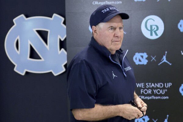 North Carolina coach Bill Belichick arrives for an NCAA college football press conference, Wednesday, March 5, 2025, in Chapel Hill, N.C. (AP Photo/Chris Seward, File)