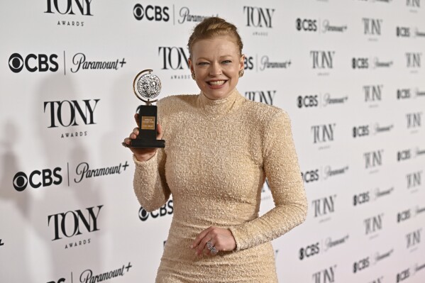 Sarah Snook poses in the press room with the award for best performance by an actress in a leading role in a play for "The Picture of Dorian Gray" during the 78th Tony Awards on Sunday, June 8, 2025, at Radio City Music Hall in New York. (Photo by Evan Agostini/Invision/AP)