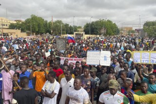 FILE - Supporters of Niger's ruling junta, gather for a protest called to fight for the country's freedom and push back against foreign interference, in Niamey, Niger, Aug. 3, 2023. A top Pentagon official says that the U.S. has not received a formal request from Niger's junta to depart the country, saying instead it has received mixed signals on whether the hundreds of U.S. troops based there are no longer welcome. (AP Photo/Sam Mednick, File)