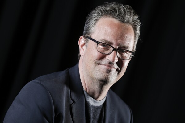 File - Matthew Perry poses for a portrait on Feb. 17, 2015, in New York. Perry, 54. The Emmy-nominated “Friends” actor whose sarcastic, but lovable Chandler Bing was among television’s most famous and quotable characters died Oct. 28, 2023. (Photo by Brian Ach/Invision/AP)