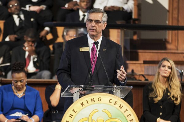 FILE - In this Monday, Jan. 20, 2020, file photo, Georgia Secretary of State Brad Raffensperger speaks during the Martin Luther King, Jr. annual commemorative service at Ebenezer Baptist Church in Atlanta. Georgia's elections board on Wednesday, approved a set of rule changes to govern the use of new voting machines that are being rushed to counties statewide for the state's fast-approaching presidential primaries in March. (Branden Camp/Atlanta Journal-Constitution via AP, File)