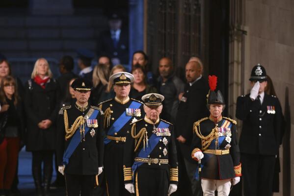 Britain's King Charles III, Britain's Princess Anne, Britain's Prince Andrew and Prince Edward attend a vigil for Queen Elizabeth II, as she lies in state on the catafalque in Westminster Hall, at the Palace of Westminster, London, Friday Sept. 16, 2022. (Daniel Leal/Pool Photo via AP)