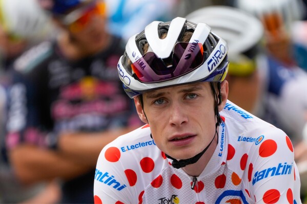 Denmark's Jonas Vingegaard waits for the start of the nineteenth stage of the Tour de France cycling race over 144.6 kilometers (89.9 miles) with start in Embrun and finish in Isola 2000, France, July 19, 2024. (AP Photo/Jerome Delay, File)