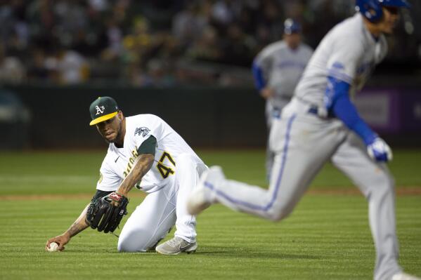 Royals top A's 5-1 in battle of baseball's two worst teams Kansas