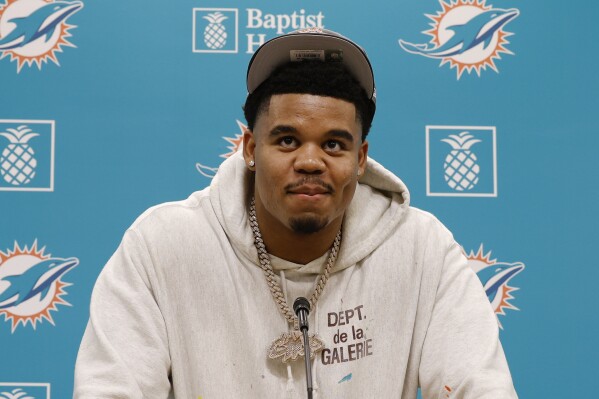 Miami Dolphins first round draft pick Chop Robinson speaks at a NFL football news conference Friday, April 26, 2024, in Miami Gardens, Fla. (AP Photo/Terry Renna)