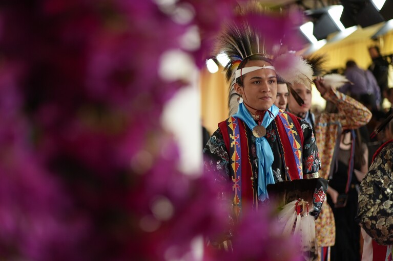 Members of the Osage Nation arrive at the Oscars on Sunday, March 10, 2024, at the Dolby Theatre in Los Angeles. (AP Photo/John Locher)