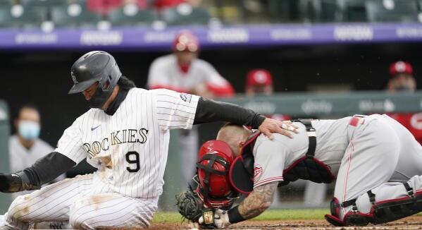 Fuentes, Gonzalez shine as Rockies hold off Reds 13-8