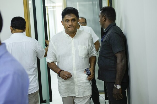 Opposition leader and the presidential candidate of United People's Power Sajith Premadasa arrives for an interview with The Associated Press in Colombo, Sri Lanka, Thursday, Sept. 12, 2024. (AP Photo/Eranga Jayawardena)