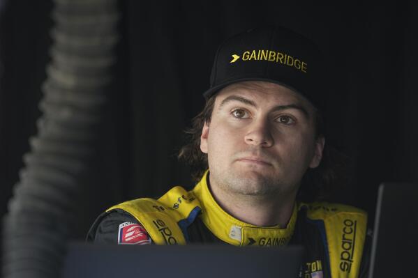 Colton Herta watches during practice for the IndyCar Grand Prix auto race at Indianapolis Motor Speedway, Friday, May 12, 2023, in Indianapolis. (AP Photo/Darron Cummings)