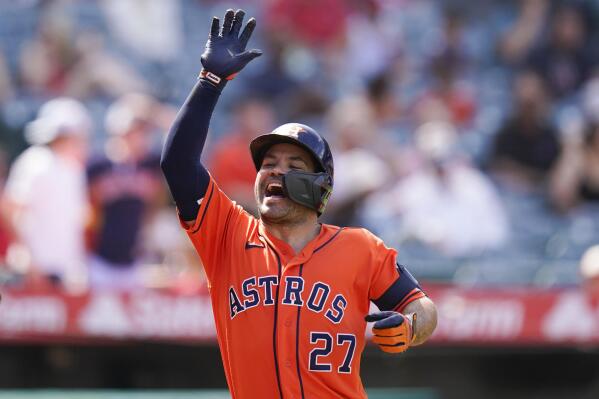 Houston Astros' Jose Altuve celebrates after his two-run home run during the seventh inning of a baseball game against the Los Angeles Angels, Sunday, Sept. 4, 2022, in Anaheim, Calif. (AP Photo/Jae C. Hong)