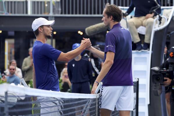 Russia's Daniil Medvedev, right, is congratulated at the net after defeating Serbia's Miomir Kecmanovic during their Round of 16 match at the Adelaide International Tennis tournament in Adelaide, Australia, Wednesday, Jan. 4, 2023. (AP Photo/Kelly Barnes)