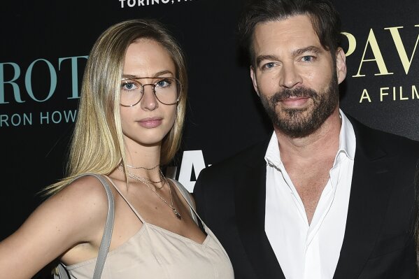 FILE - This May 28, 2019 file photo shows Singer Harry Connick Jr. with his daughter Georgia at a special screening of "Pavarotti" in New York. CBS will air a two-hour special, "United We Sing: A Grammy Salute to the Unsung Heroes" to honor essential workers across America. The special will air June 21 and will follow host Connick Jr. and his filmmaker-daughter Georgia on road trip celebrating and thanking essential workers during the coronavirus pandemic. (Photo by Evan Agostini/Invision/AP, File)