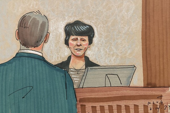 In this courtroom sketch, shooting survivor Andrea Wedner testifies, Wednesday, June 14, 2023, in Pittsburgh, in the federal trial of Robert Bowers. Bowers is accused of shooting to death 11 worshippers in a synagogue more than four years ago, the deadliest antisemitic attack in U.S. history. (David Klug via AP)