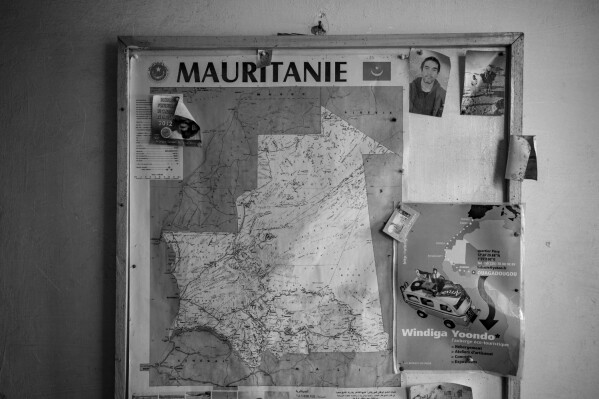 An old map of Mauritania is displayed in a hostel in Nouadhibou, Mauritania, Nov. 30, 2021. (AP Photo/Felipe Dana, file)