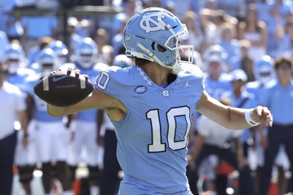 North Carolina quarterback Drake Maye (10) throws a pass during the first quarter of an NCAA college football game against Minnesota, Saturday, Sept. 16, 2023, in Chapel Hill, N.C. (AP Photo/Reinhold Matay)
