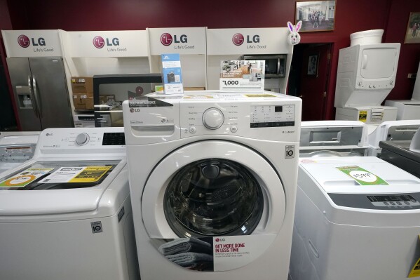 File - Washing machines are displayed at Sam's Appliances TV & Furniture, on March 25, 2021, in Norwood, Mass. On Thursday, the Labor Department reports on U.S. consumer prices for July. Economists expect the report to show prices rose 3.3%. (AP Photo/Steven Senne, File)