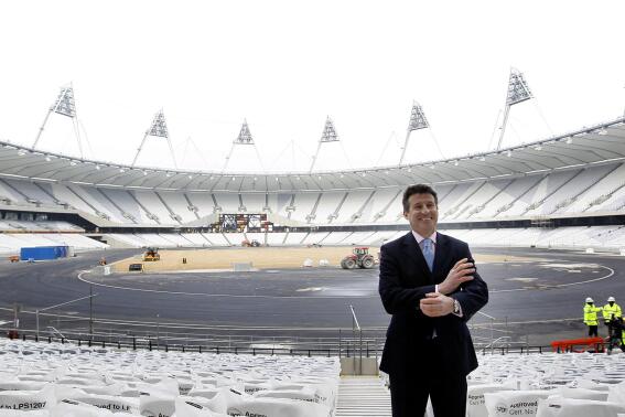 FILE - Sebastian Coe poses for the media at the Olympic Stadium, in London, on March, 15, 2011. The governing body of track and field acted Friday against suspected systematic cheating in qualifying events for the Tokyo Olympics and age manipulation of athletes up to 20 years ago. “The integrity of our sport is our highest priority at World Athletics,” federation president Sebastian Coe said in a statement. “Without it, we don’t have a sport.” ( AP Photo/Alastair Grant, File)