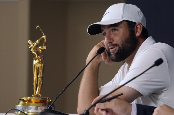 Scottie Scheffler speaks to the media after winning The Players Championship golf tournament Sunday, March 17, 2024, in Ponte Vedra Beach, Fla. (AP Photo/Marta Lavandier)