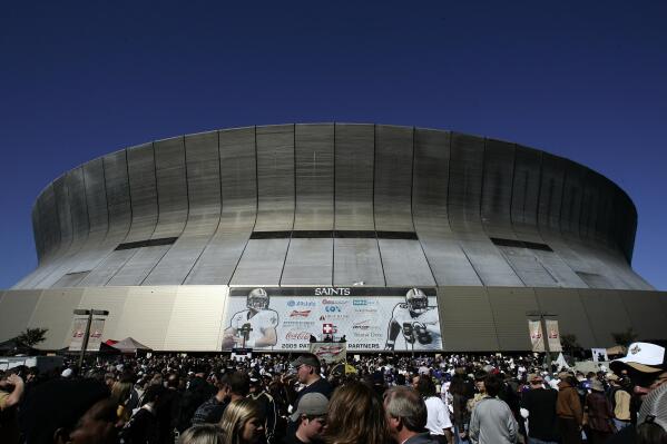 FILE - Fans arrive at the Louisiana Superdome before an NFL football game between the New Orleans Saints and the New York Giants in New Orleans, in this Sunday, Oct. 18, 2009, file photo. Amid public and political scrutiny, the New Orleans Saints have adopted a new refund policy allowing fans to relinquish their season tickets and get their money back. (AP Photo/Patrick Semansky, File)