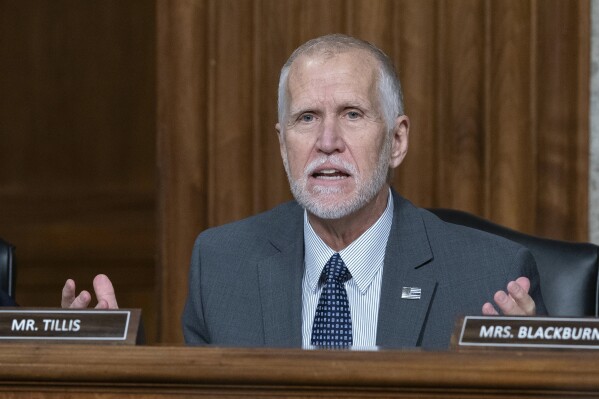Sen. Thom Tillis, R-N.C., questions Robert F. Kennedy Jr., President Donald Trump's choice to be the Secretary of Health and Human Services, as he testifies before the Senate Finance Committee during his confirmation hearing, at the Capitol in Washington, Wednesday, Jan. 29, 2025. (AP Photo/Jose Luis Magana, file)
