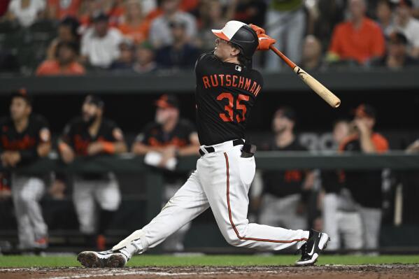 Baltimore Orioles' Jorge Mateo, left, is embraced by Ramon Urias