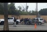In this image made from video, Mexican security forces frisk men at a checkpoint in Ensenada, Mexico, Thursday, May 2, 2024. Mexican authorities said Thursday they have found tents and questioned a few people in the case of two Australians and an American who went missing over the weekend in the Pacific coast state of Baja California. (Ǻ Photo)