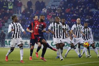 Joao Pedro of Cagliari Calcio kicks the ball during the Serie A soccer match between Cagliari Calcio and Udinese Calcio at Unipol Domus Stadium in Cagliari, Italy, Saturday Dec. 18, 2021. (Alessandro Tocco/LaPresse via AP)