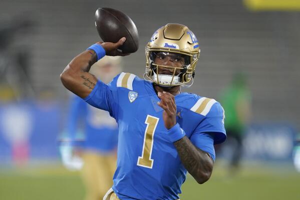 UCLA quarterback Dorian Thompson-Robinson warms up before an NCAA college football game against Fresno State on Saturday, Sept. 18, 2021, in Pasadena, Calif. If anyone symbolizes the rollercoaster that has been UCLA football during the Chip Kelly era it is quarterback Dorian Thompson-Robinson. (AP Photo/Marcio Jose Sanchez)