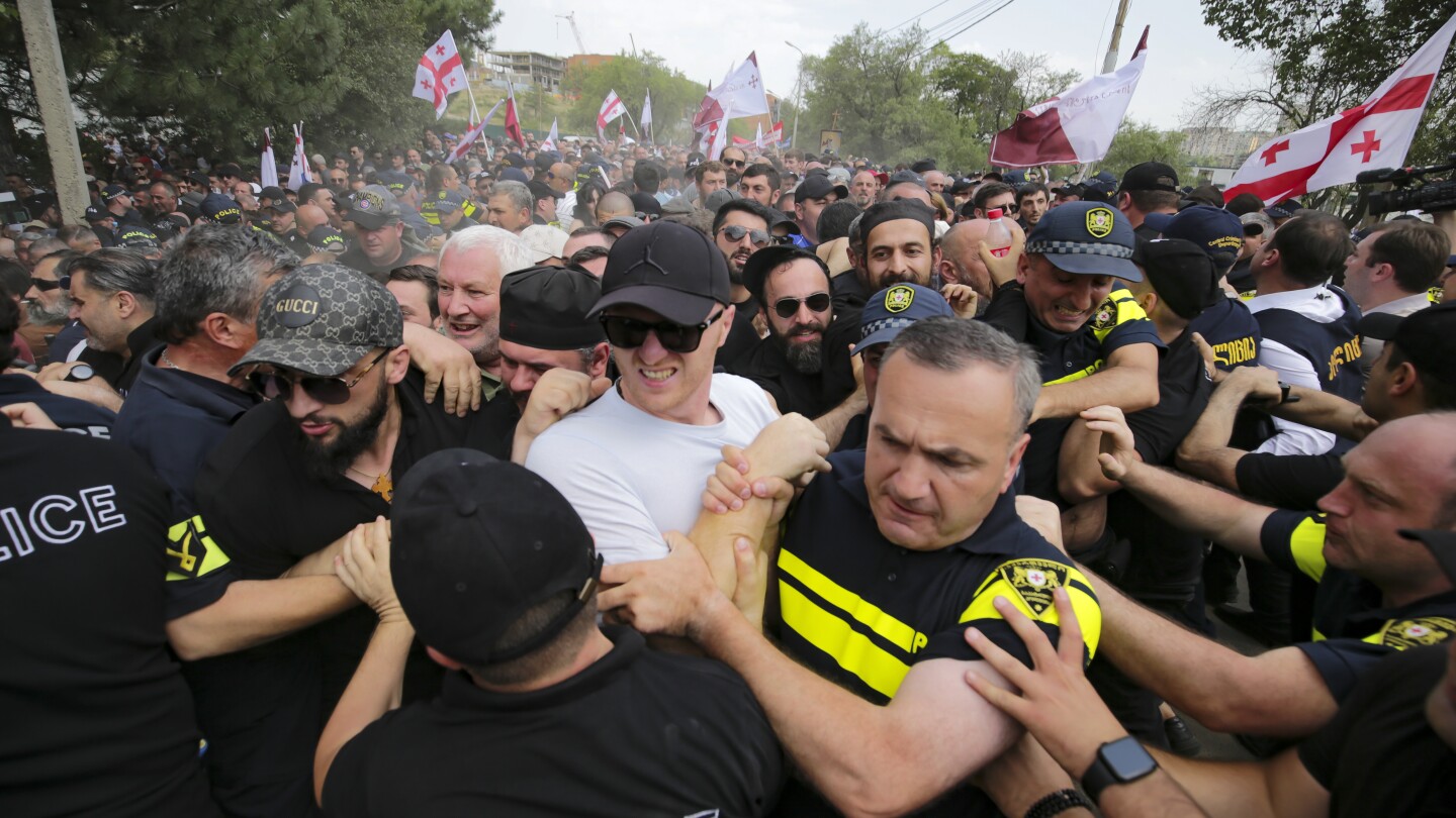 TBILISI, Georgia (AP) — Georgia's parliament on Tuesday approved sweeping