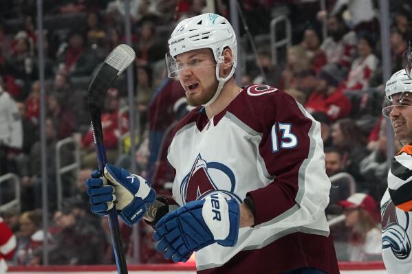 Colorado Avalanche right wing Valeri Nichushkin (13) celebrates his goal against the Detroit Red Wings in the third period of an NHL hockey game Wednesday, Feb. 23, 2022, in Detroit. (AP Photo/Paul Sancya)