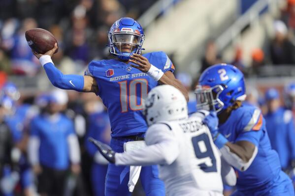 Boise State quarterback Taylen Green (10) throws the ball against Utah State in the second half of an NCAA college football game, Friday, Nov. 25, 2022, in Boise, Idaho. Boise State won 42-23. (AP Photo/Steve Conner)