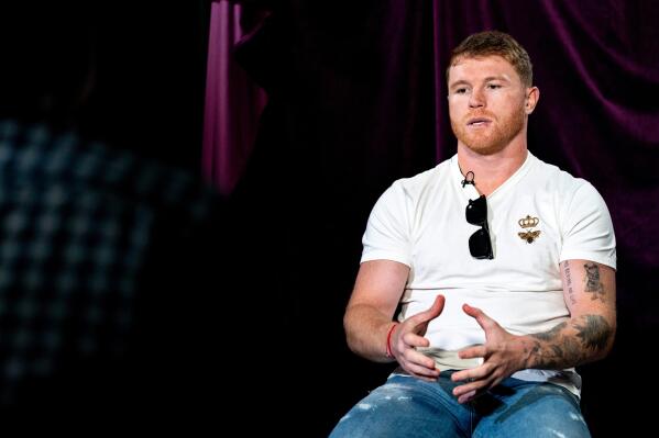 Boxer Canelo Álvarez, of Mexico, speaks during an interview with The Associated Press, Tuesday, June 28, 2022, in New York. Golovkin and Canelo Álvarez, of Mexico, will meet for a third time on Sept. 17, 2022, in Las Vegas.  (AP Photo/Julia Nikhinson)