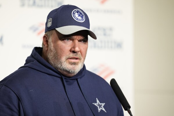 Dallas Cowboys head coach Mike McCarthy speaks to reporters following an NFL football game against the Green Bay Packers, Sunday, Jan. 14, 2024, in Arlington, Texas. The Packers won 48-32. (AP Photo/Sam Hodde)