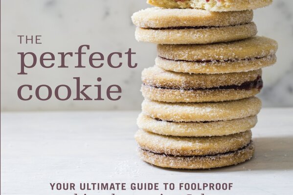 
              This image provided by America's Test Kitchen in January 2019 shows the cover for the cookbook “The Perfect Cookie.” It includes a recipe for a Chocolate Chip Skillet Cookie. (America's Test Kitchen via AP)
            