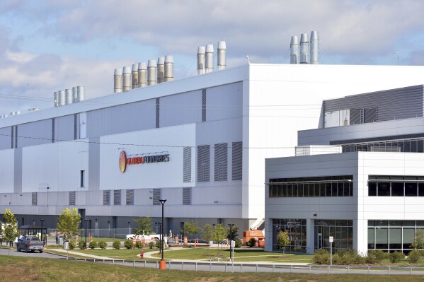 FILE - This photo shows the Globalfoundries campus on Sept. 22, 2014, in Malta, N.Y. The Biden administration said Monday, Feb. 19, 2024, that the government would provide $1.5 billion to the computer chip company GlobalFoundries to expand its domestic production in New York and Vermont. The announcement is the third award of financial support for a semiconductor company under the 2022 CHIPS and Science Act. (John Carl D'Annibale/The Albany Times Union via AP, File)