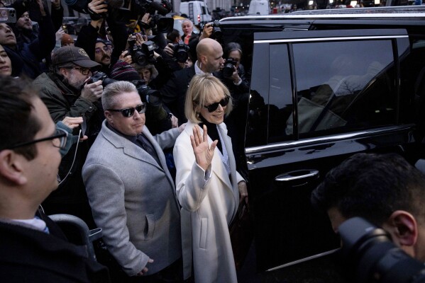 FILE - E. Jean Carroll leaves federal court in New York on January 26, 2024.  A jury is trying to determine whether an $83 million defamation verdict will be enough to stop Trump from continuing his attacks on Carroll.  The jury on Friday imposed an extreme defamation award on Trump, finding that the former president maliciously harmed Carroll's reputation after she accused him of sexually assaulting her at a Manhattan department store.  (AP Photo/Yuki Iwamura, File)