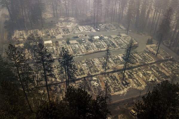 
              FILE - In this Thursday, Nov. 15, 2018, file photo, residences leveled by the wildfire line a neighborhood in Paradise, Calif. More than 2.7 million Californians live in areas that are at very high risk for wildfires. One in 12 homes in California are at high risk of burning in a wildfire. The more information we can share about where and how we're falling short, the quicker we can come together on potential solutions. (AP Photo/Noah Berger, File)
            