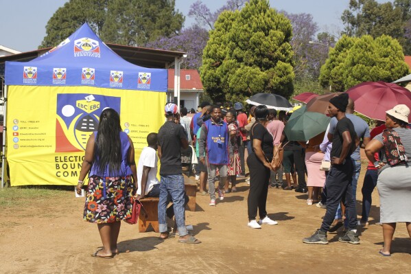 Voters queue to cast their votes in Manzini, Eswatini, Friday, Sept. 29, 2023. The small southern African nation of Eswatini is holding elections to decide part of the makeup of its parliament while its extremely wealthy king retains absolute power. (AP Photo)