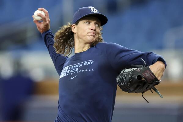 Tampa Bay Rays starting pitcher Tyler Glasnow throws a live batting practice as he returns from Tommy John surgery prior to a baseball game against the Los Angeles Angels, Tuesday, Aug. 23, 2022, in St. Petersburg, Fla. (AP Photo/Mike Carlson)